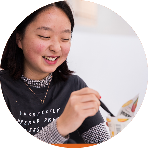 Student eating food in the SMFA Cafe
